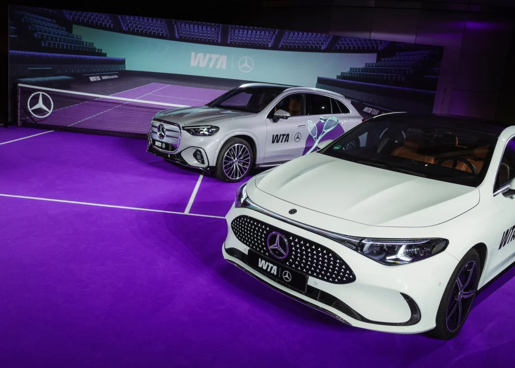 Mercedes-Benz vehicles displayed at a WTA tennis venue as part of the WTA partnership and on-site brand activation.
